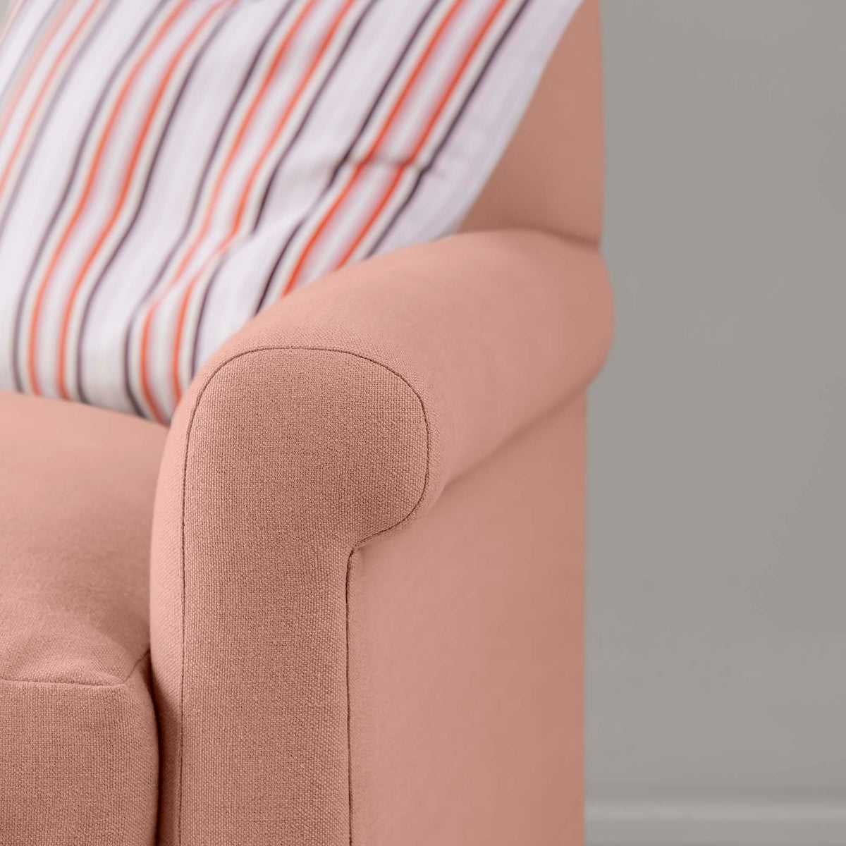 Detailed view of Roseberry linen upholstery on the armrest by Nicola Harding.