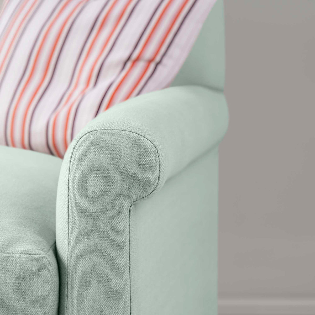 Detailed view of Sky linen upholstery on the armrest by Nicola Harding.