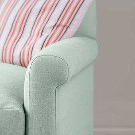 Detailed view of Sky linen upholstery on the armrest by Nicola Harding.