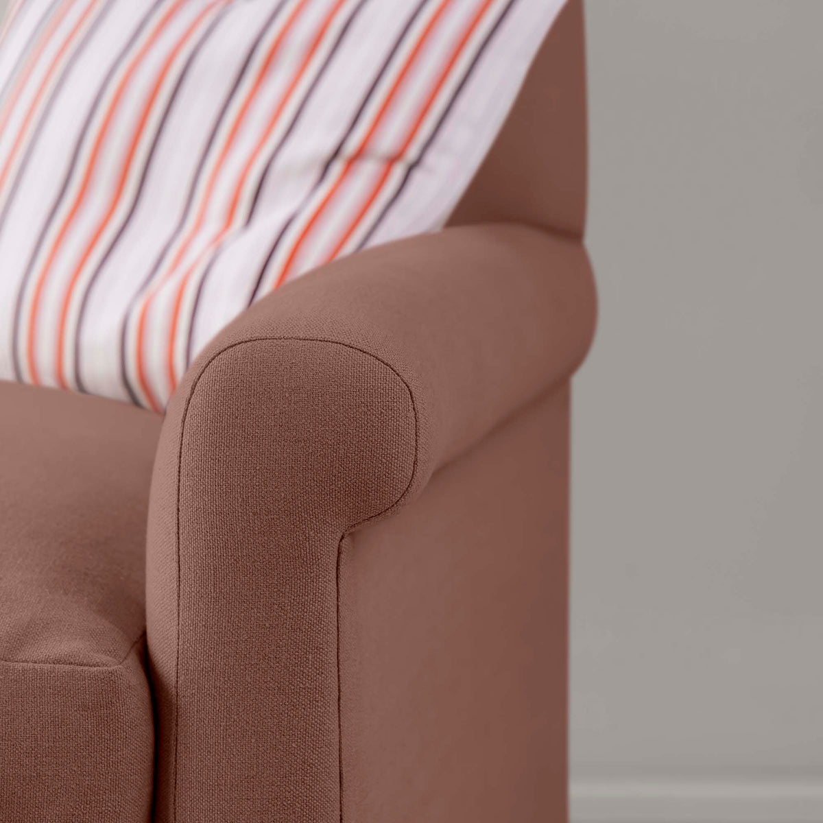Detailed view of Sweet Briar linen upholstery on the armrest by NiX.