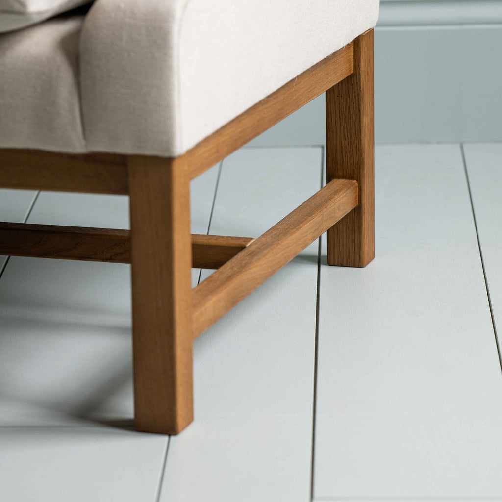  Wooden Foot Frame Design Closeup of Front Row 3 Seater Upholstered Bench in Laidback Linen Dove Frame and Regatta Cotton Blue Seat - By NiX 
