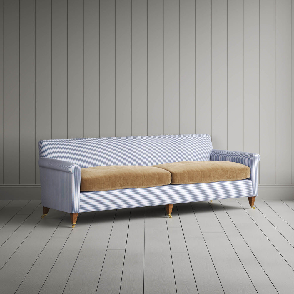 Angled view of the Ticking Aqua Brown Idler sofa by NiX