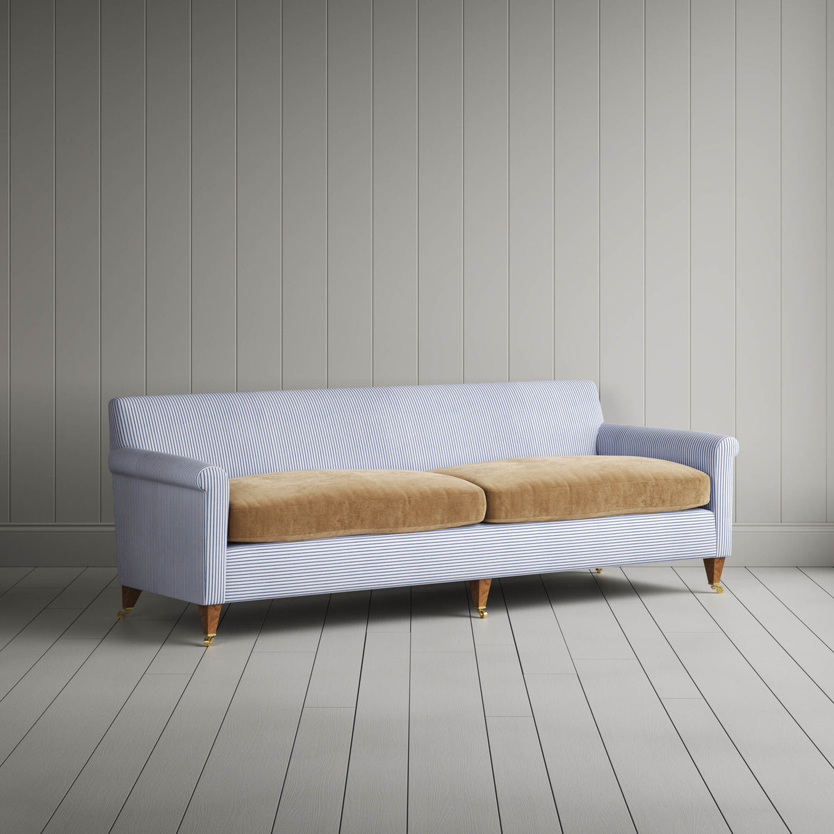 Angled view of the Ticking Aqua Brown Idler sofa by NiX