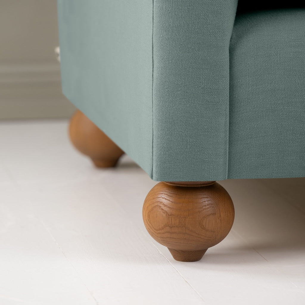  Dolittle Big Love Seat close-up detail of the spherical feet by NiX. 