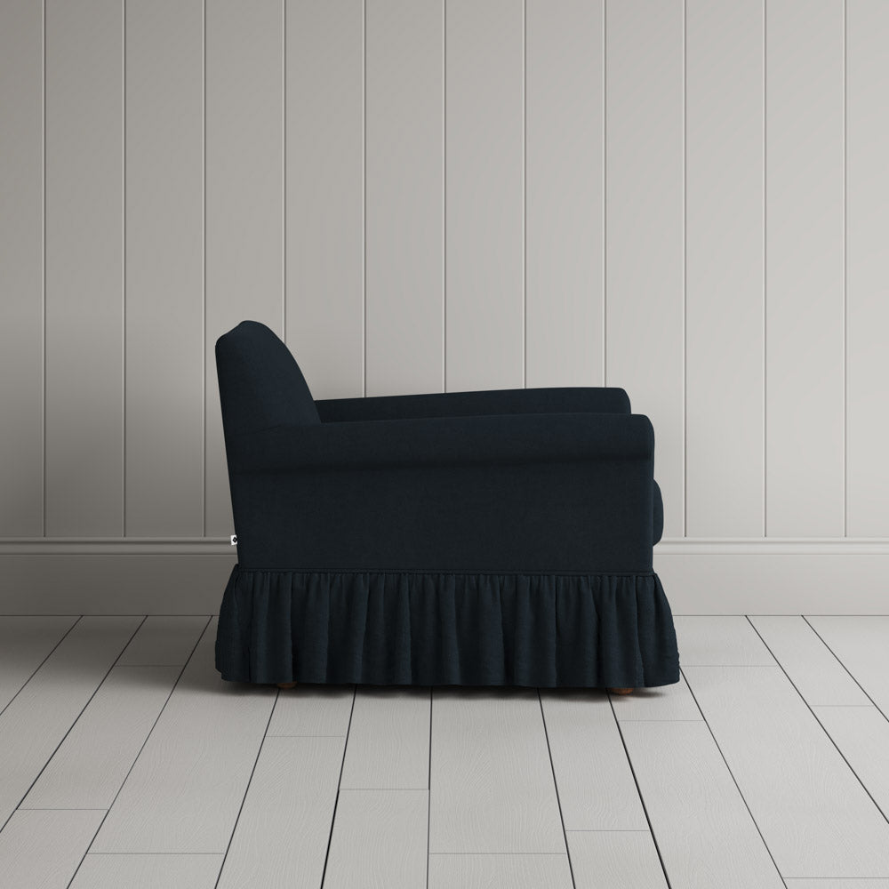  Side Profile of  Curtain Call Armchair in Laidback Linen Midnight 