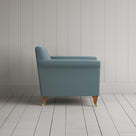 Side view of Idler Armchair in Intelligent Velvet Mineral