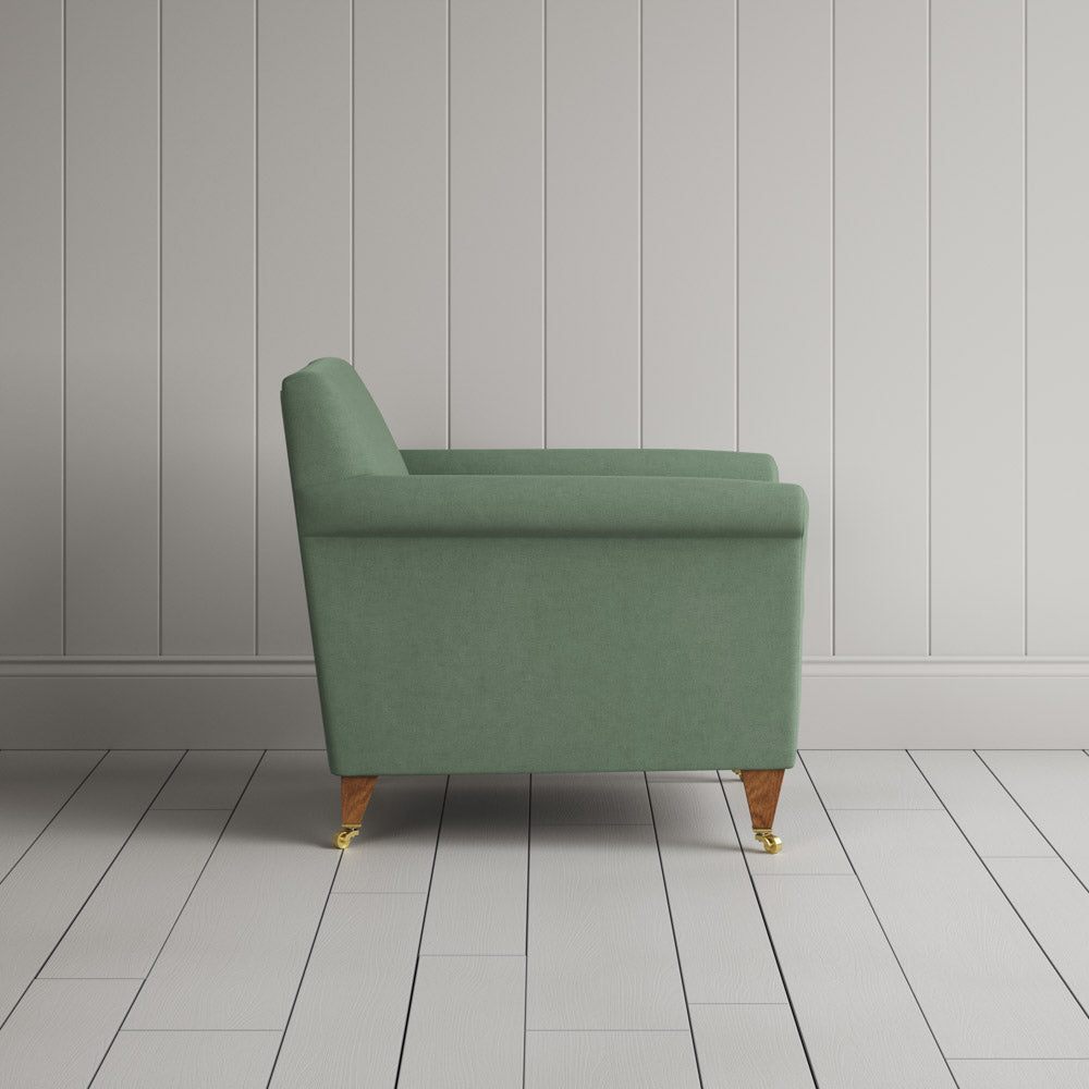 Side View of Idler Armchair in Laidback Linen Moss