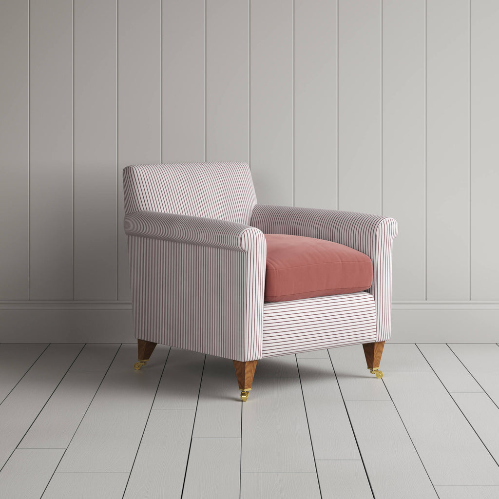  Idler Armchair in Ticking Berry Frame and Intelligent Velvet Damson Seat angled view 