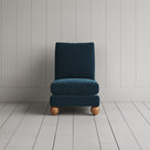 Perch Armchair in intelligent velvet aegean, full front view by Nicola Harding.