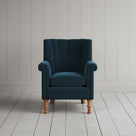 Time Out Armchair fluted back design in intelligent velvet aegean, front view by Nicola Harding.