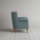 Time Out Armchair in intelligent velvet mineral, side view by NiX.