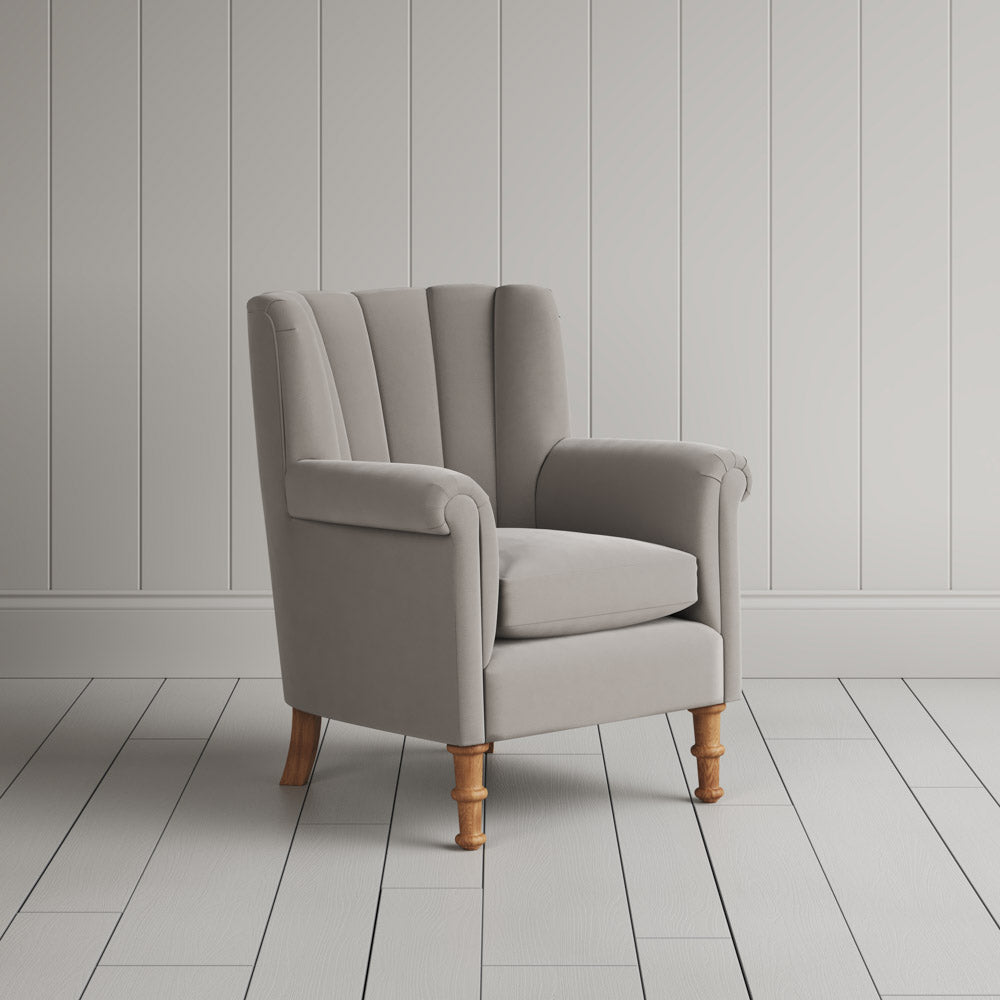  Time Out Armchair fluted back armchair in intelligent velvet moonstone, angled view by NiX. 