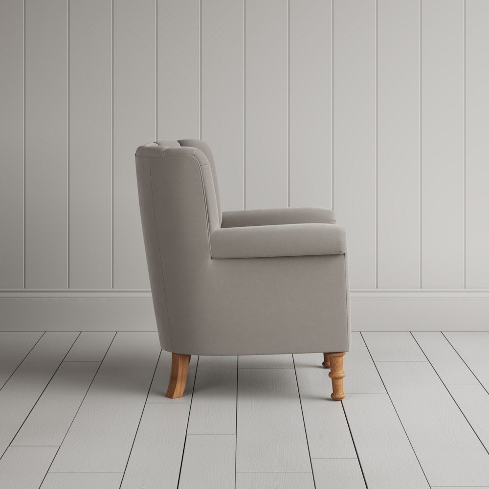  Time Out Armchair in intelligent velvet moonstone, side view by NiX. 