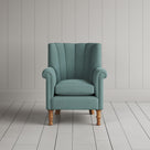 Time Out Armchair fluted back design in laidback linen cerulean, front view by Nicola Harding.