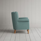 Time Out Armchair close-up detail of the turned timber front legs by NiX.