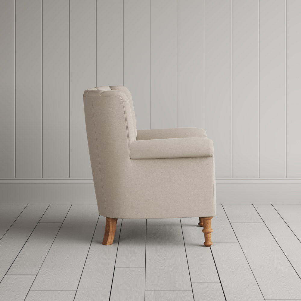 Time Out Armchair in laidback linen dove, side view by NiX.