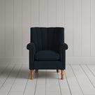 Time Out Armchair fluted back design in laidback linen midnight, front view by Nicola Harding.