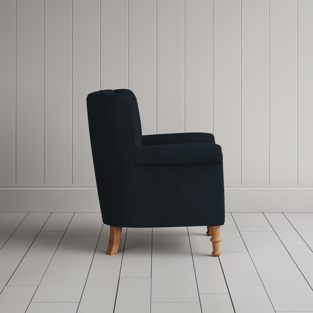 Time Out Armchair in laidback linen midnight, side view by NiX. 
