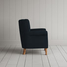 Time Out Armchair in laidback linen midnight, side view by NiX.
