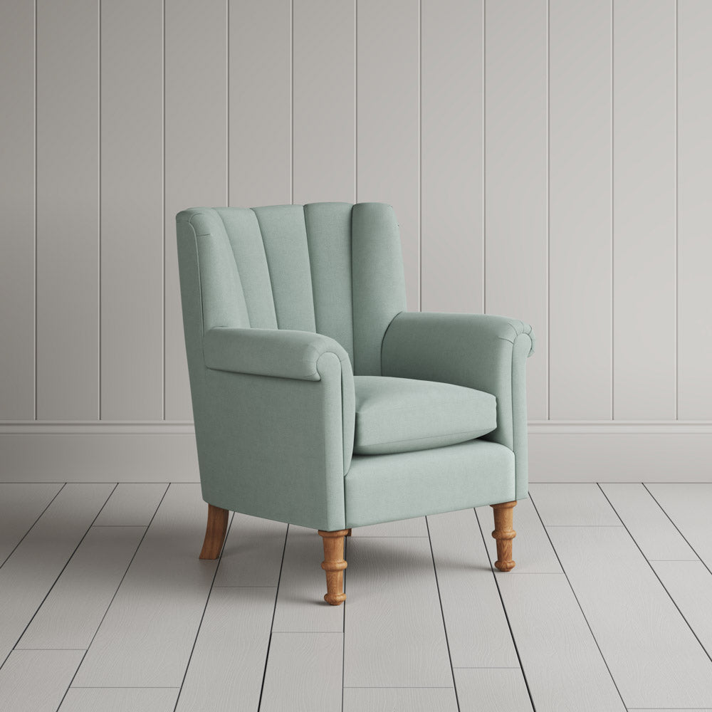 Time Out Armchair fluted back armchair in laidback linen sky, angled view by NiX.