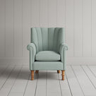 Time Out Armchair fluted back design in laidback linen sky, front view by Nicola Harding.