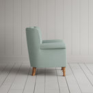 Time Out Armchair in laidback linen sky, side view by NiX.