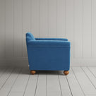 Side profile of the Harbour Blue corduroy Dolittle armchair - By NiX