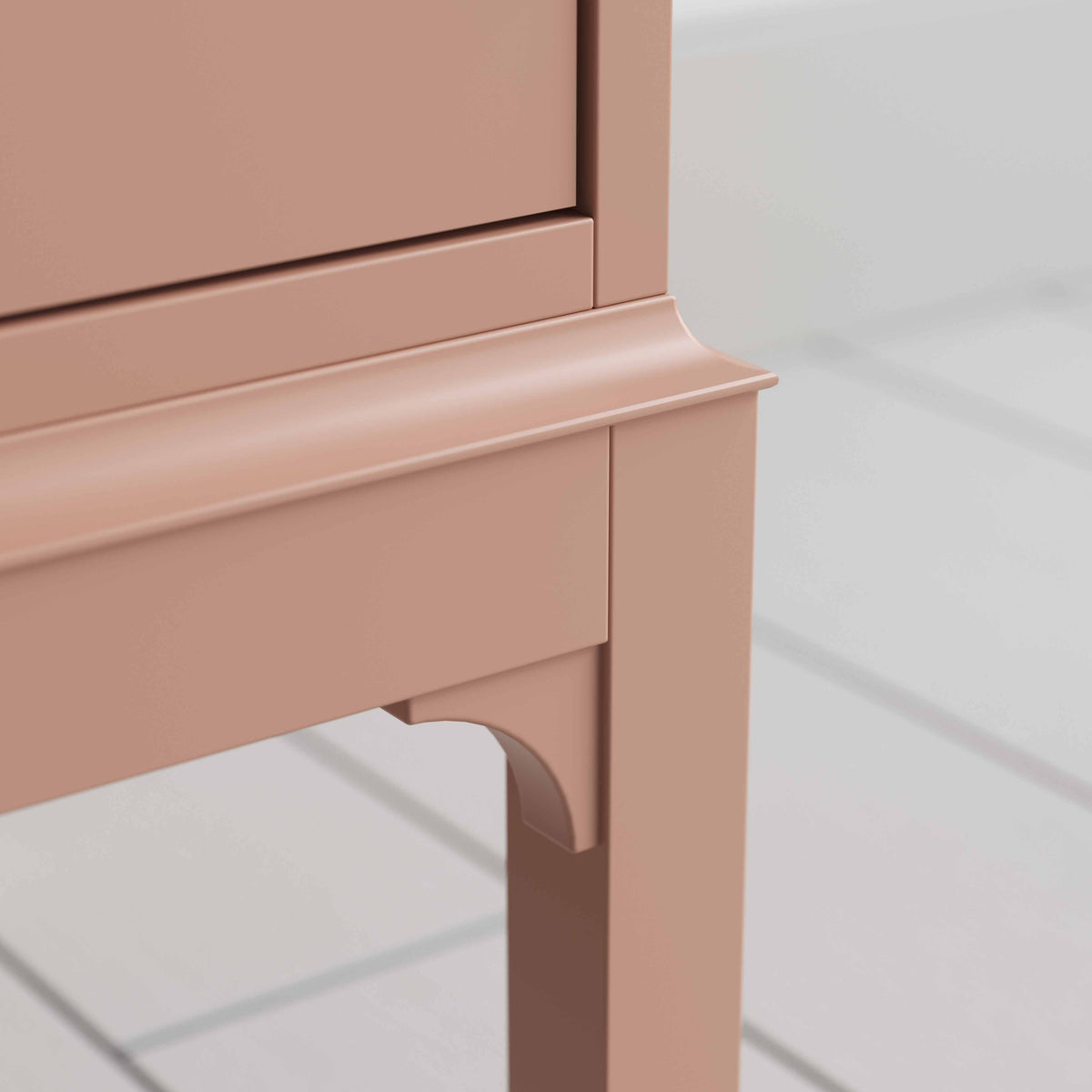 A close up of small pink bedside table with a side door, perfect for storing items - By NiX Studio