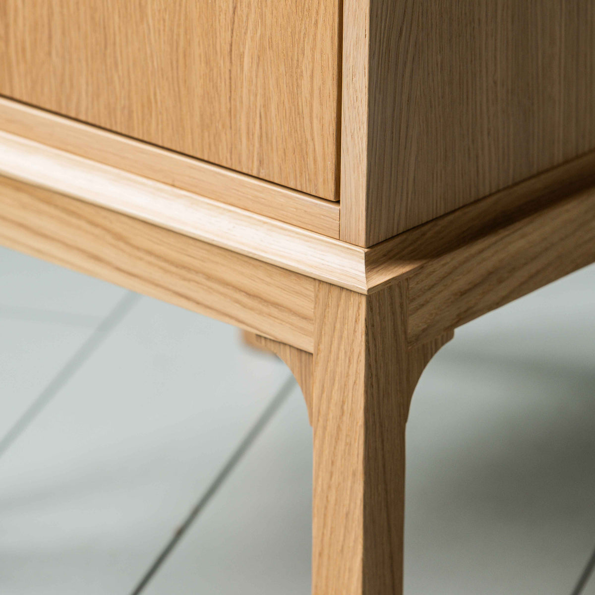 Leg Edge Design closeup of Bits and Bobs Bedside Table, Natural Oak, Left Hand Side - Nicola Harding