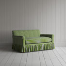 Angled view of Curtain Call love seat in Colonnade Cotton Green and Wine by Nicola Harding & Co