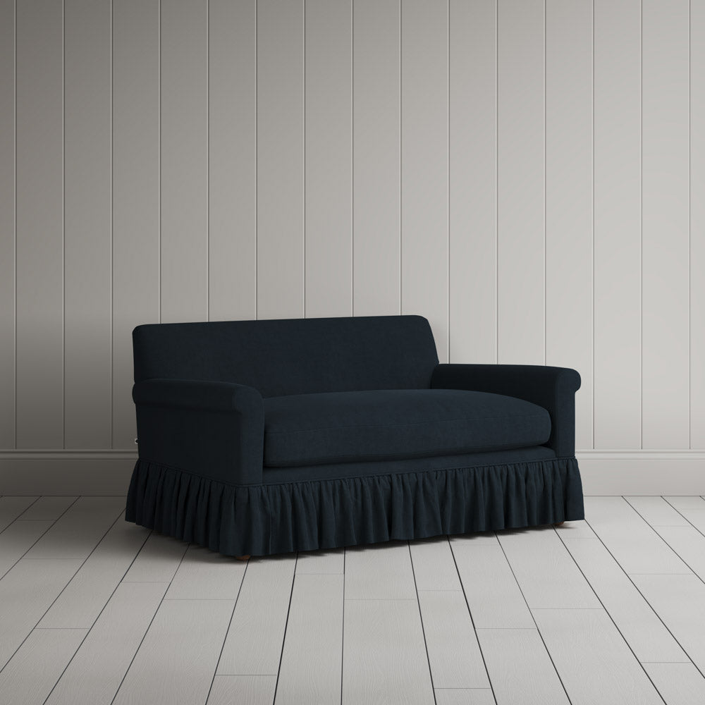  Angled view of the Laidback Linen Midnight Curtain Call love seat by NiX. 