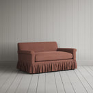 Three-quarter view of the Laidback Linen Sweet Briar Curtain Call love seat by NiX.