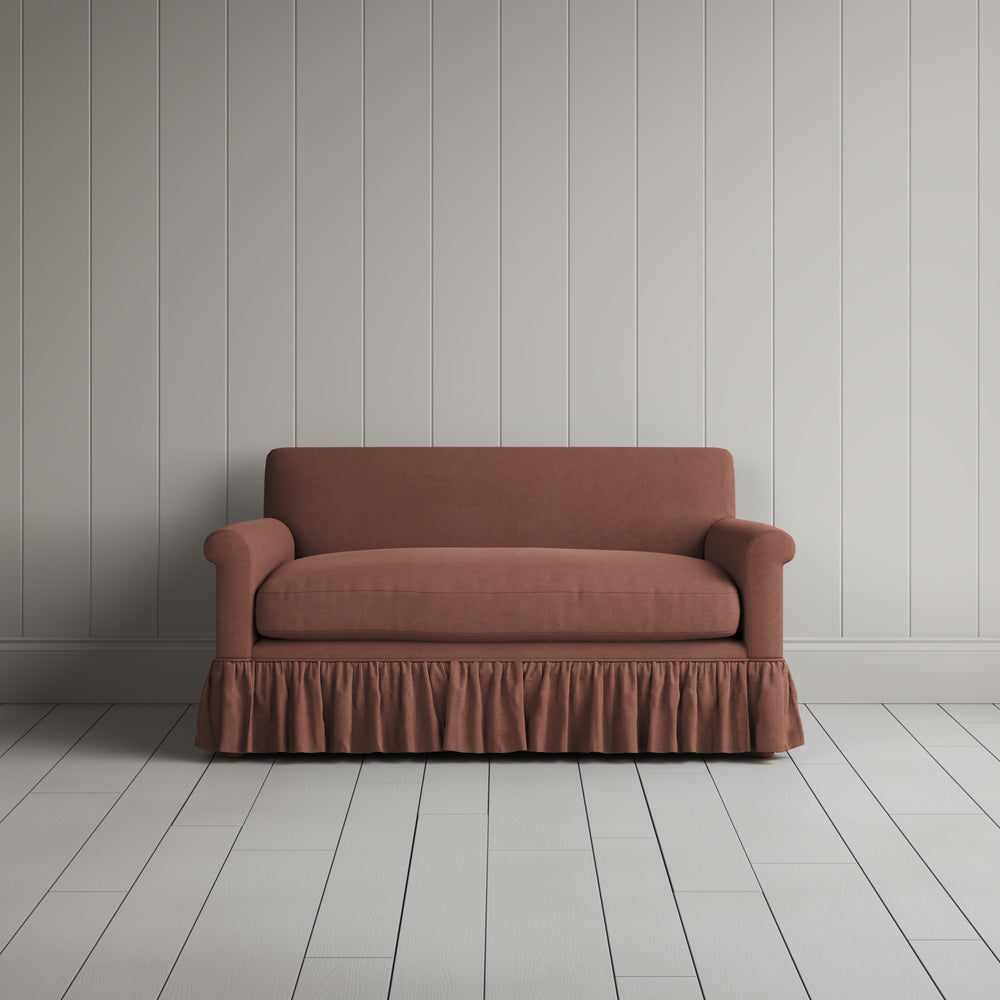 Front portrait of the Laidback Linen Curtain Call love seat by Nicola Harding interiors.