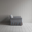 Compact side profile of a luxury blue cotton love seat by Nicola Harding.