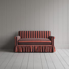 Front view of the flame cotton nix sofa highlighting its gathered skirt base.