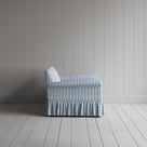 Side profile of a luxury patterned cotton love seat by Nicola Harding.