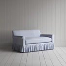 Three-quarter view of the Ticking Cotton Aqua Brown Curtain Call love seat by NiX.