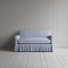 Front view of the Ticking Cotton Curtain Call love seat by Nicola Harding interiors.