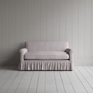 Front view of the Ticking Cotton Curtain Call love seat by Nicola Harding interiors.