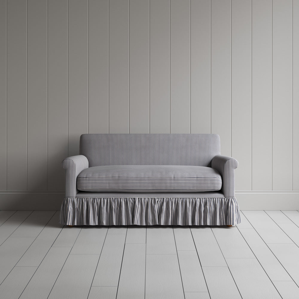 Front portrait of the Ticking Cotton Curtain Call love seat by Nicola Harding interiors.