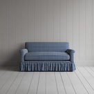 Front shot of the Well Plaid Cotton Curtain Call love seat by Nicola Harding interiors.