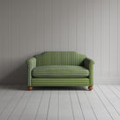 Front view of the Colonnade Cotton Green and Wine Dolittle love seat by Nicola Harding interiors.