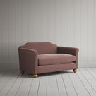 Angled view of the Velvet Dusky Pink Idler love seat by NiX