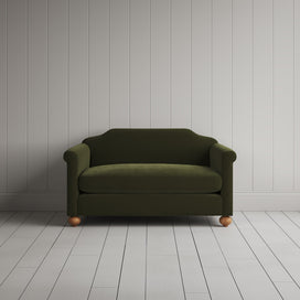 Front portrait of the juniper green Dolittle love seat by Nicola Harding interiors.