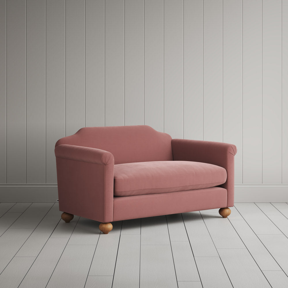  Dolittle Big Love Seat in intelligent velvet rose, angled view by Nicola Harding. 