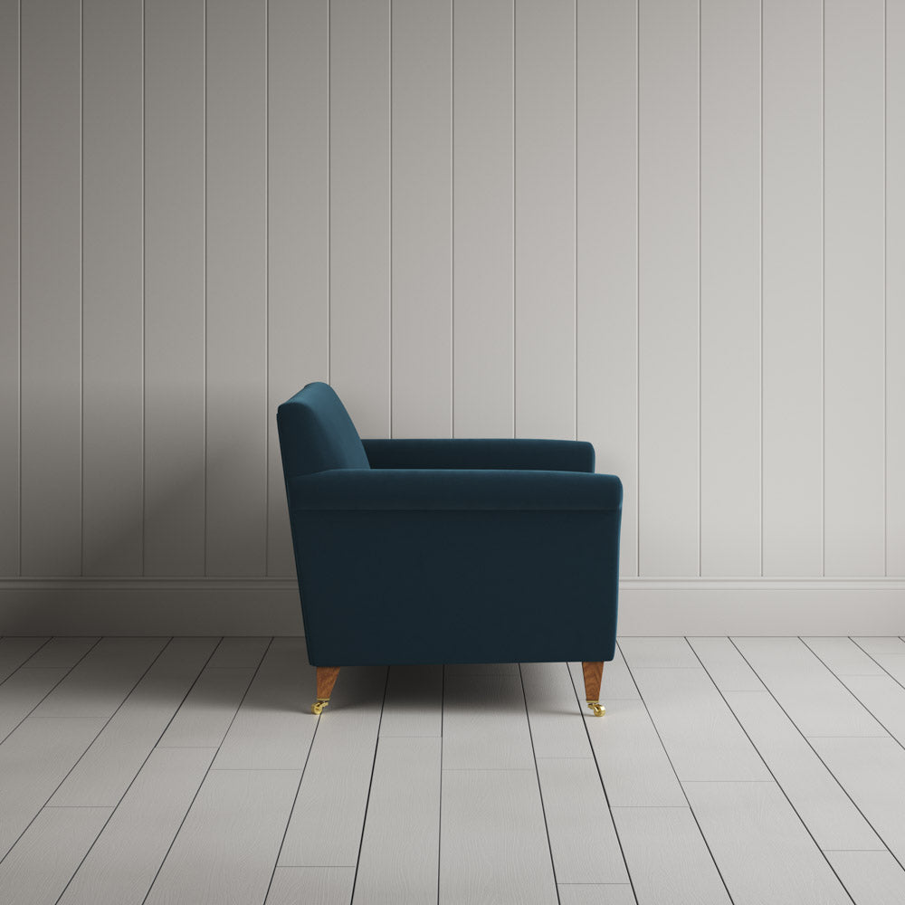 Side profile of the Velvet Aegean Idler love seat by Nicola Harding
