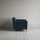 Side profile of the Velvet Aegean Idler love seat by Nicola Harding