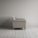 Side profile of the Idler seat in Moonstone Intelligent Velvet by Nix.