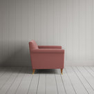 Side profile of the Idler seat in Rose Intelligent Velvet by Nix.