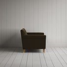 Side profile of the Idler seat in Seaweed Intelligent Velvet by Nix.